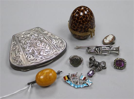 Mixed items including and amber bead brooch, a white metal compact, a modern silver miniature trumpet etc.